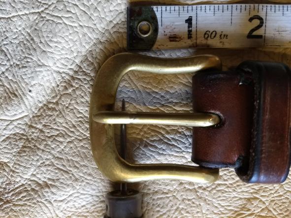 Measure from the inside edge of the belt buckle